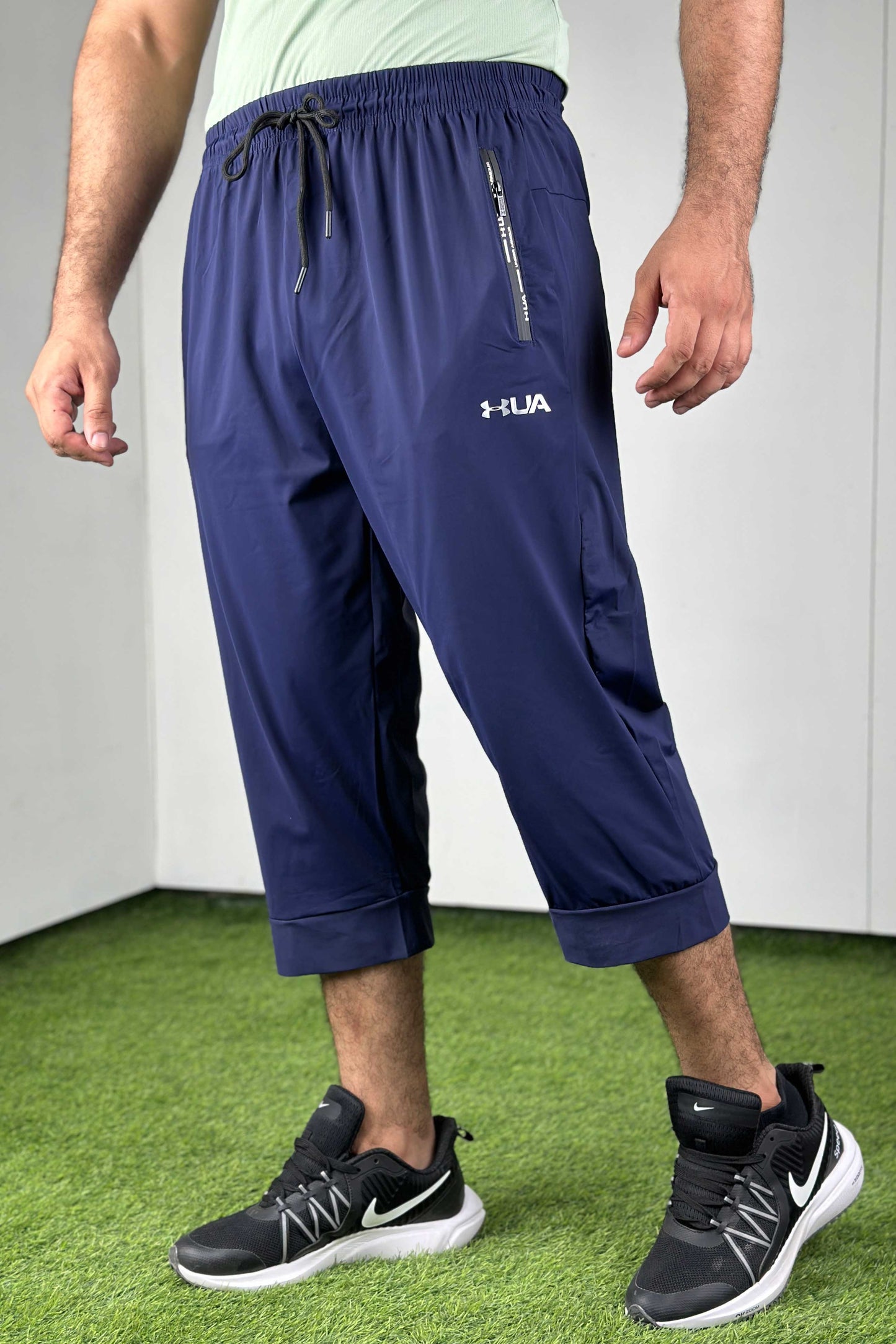 UA 3-QTR SHORTS 0424036