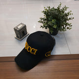 GCCI Black Golden Embroidery Logo Emblem Cap - Italiano.pk